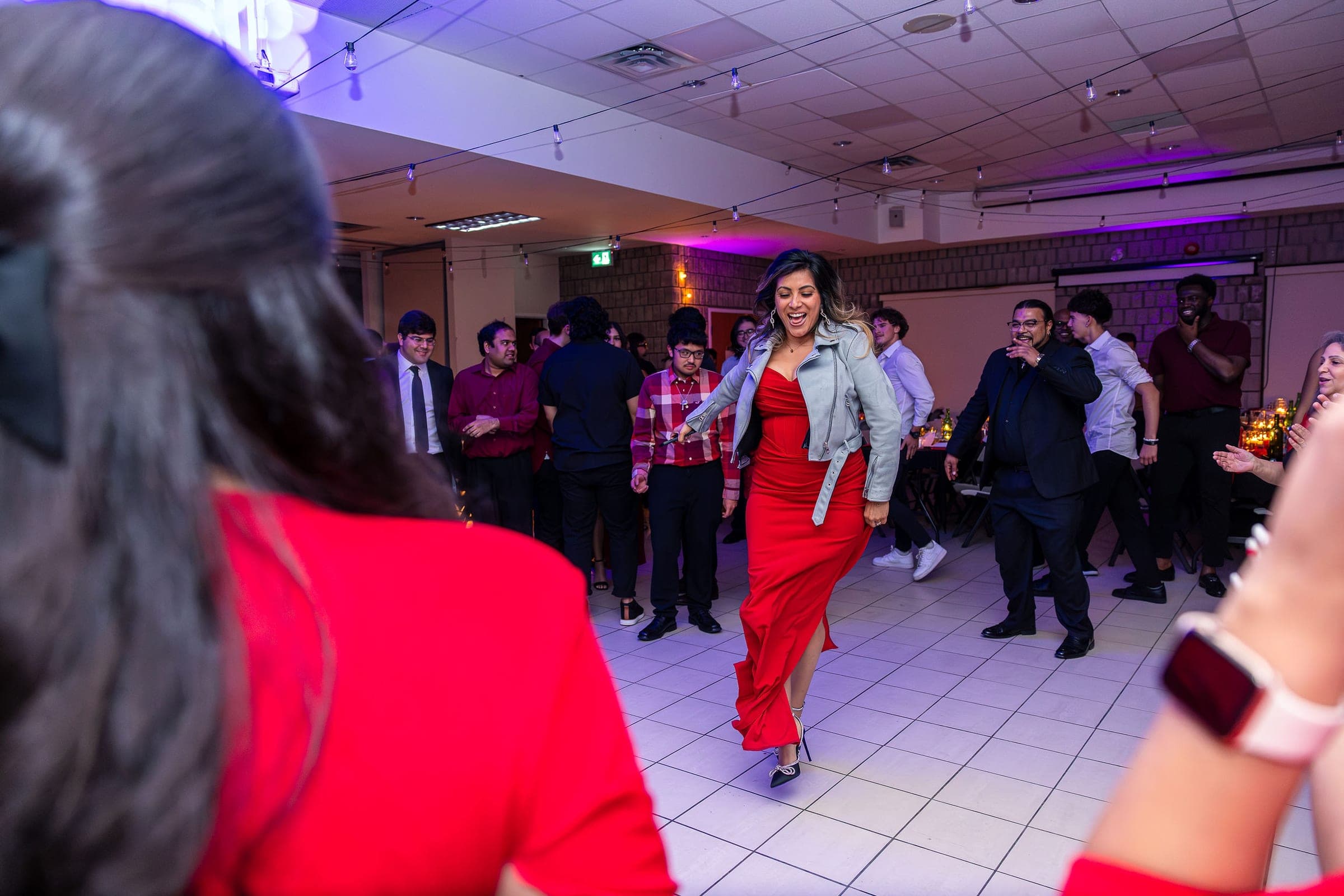 The dance floor under the purple wash