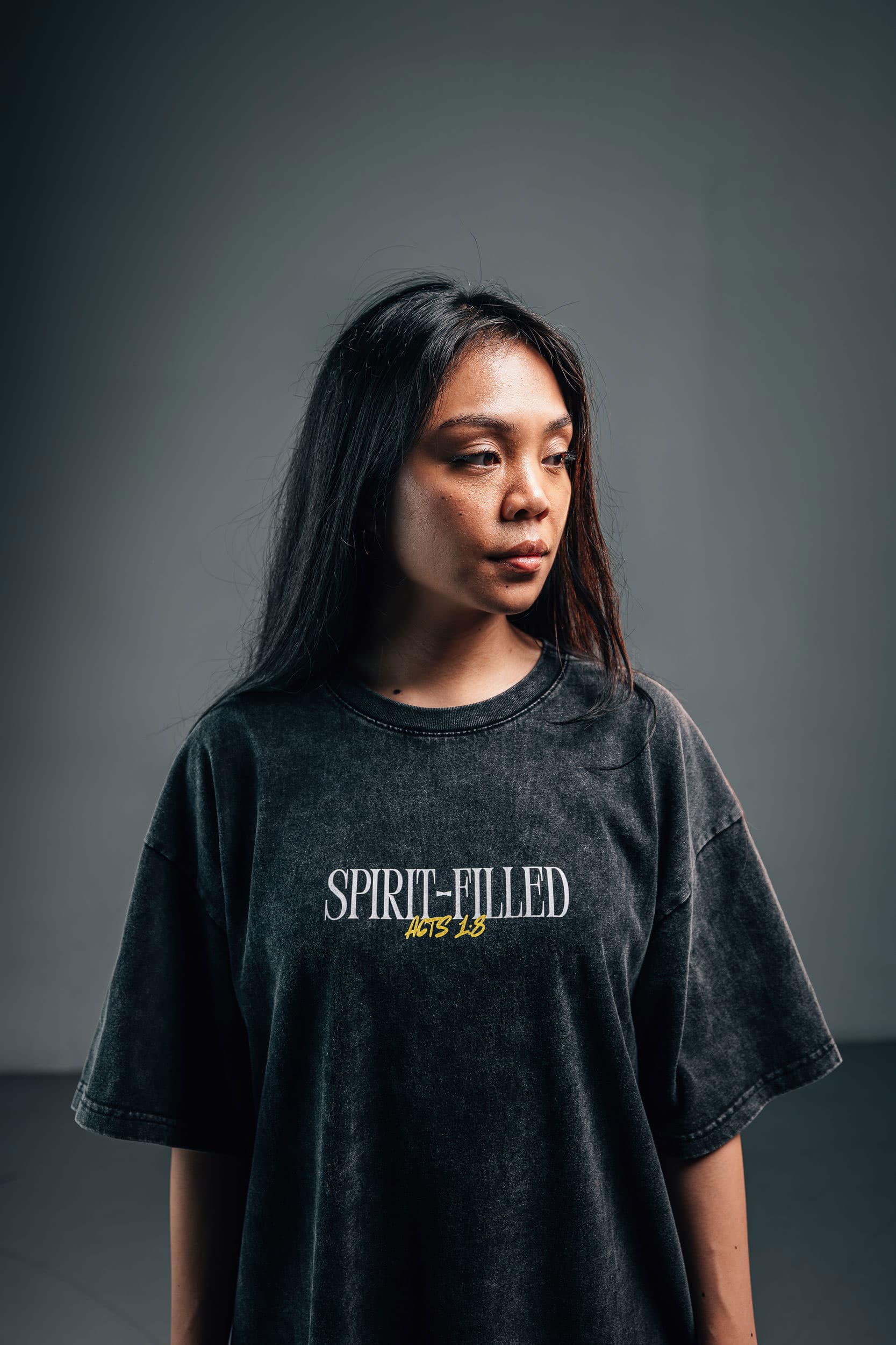 The acid wash Spirit-Filled tee worn, chest wordmark
