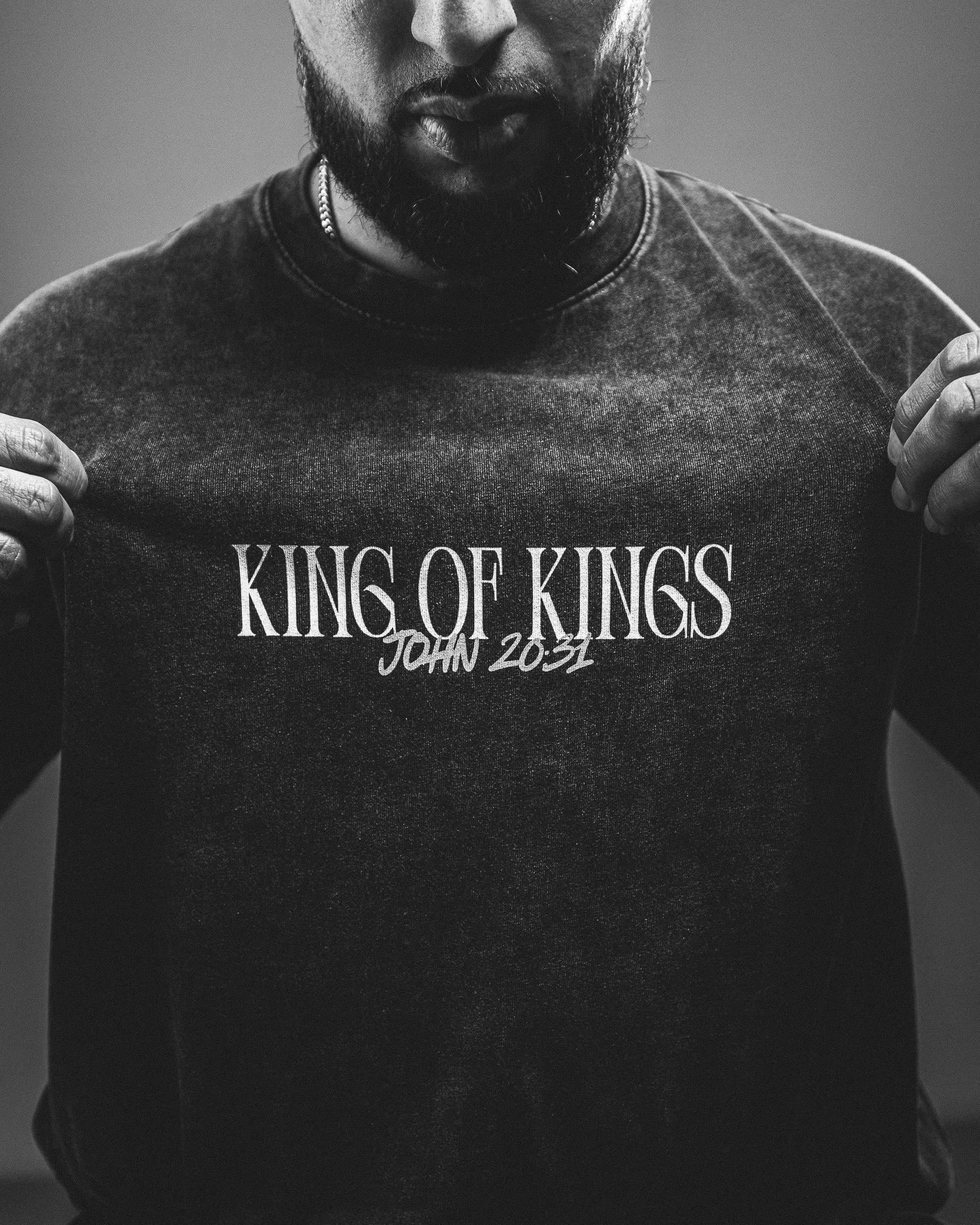 The black King of Kings tee worn, chest wordmark